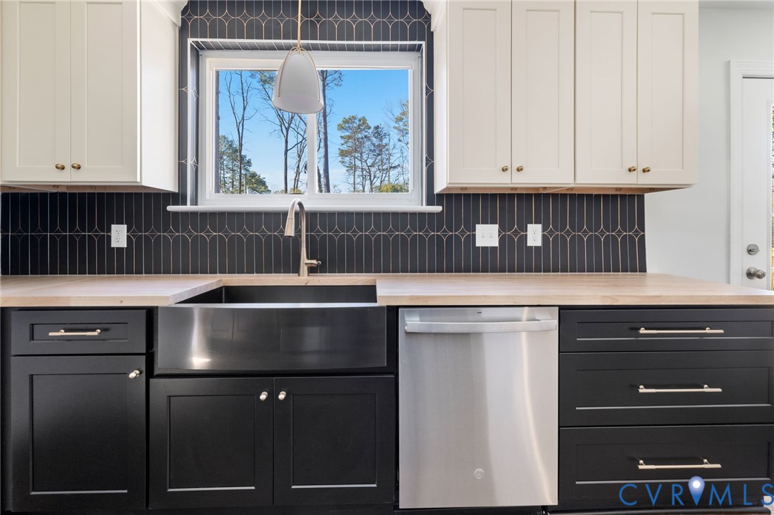 2002 Milbank Road Henrico, VA 23229 - Photo 8 of 23 a kitchen with a sink and a window