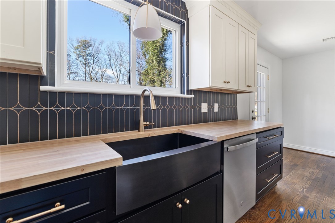 2002 Milbank Road Henrico, VA 23229 - Photo 9 of 23 a kitchen with a sink and cabinets
