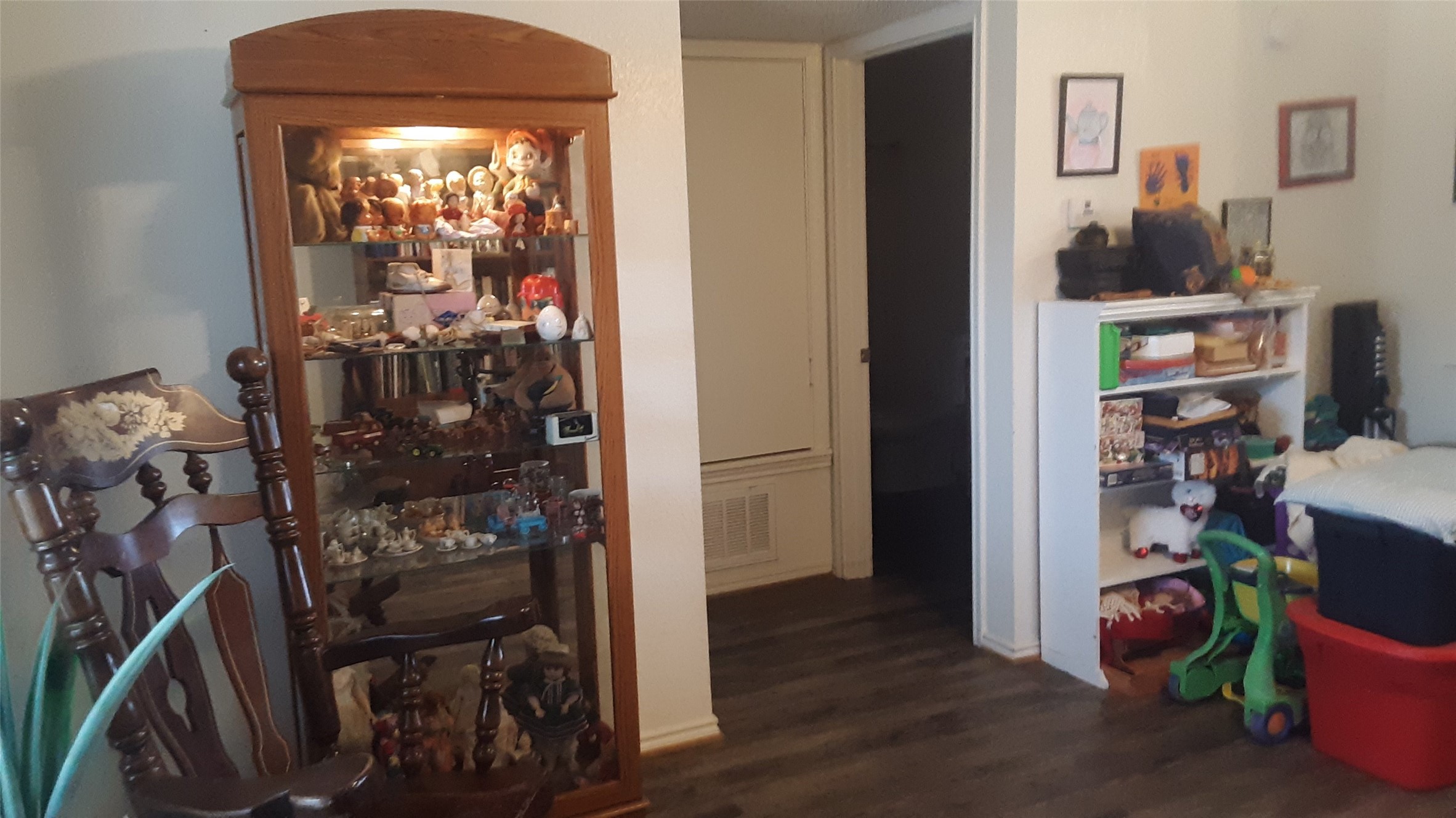303 E Avenue Hooks, TX 75561 - Photo 11 of 19 a view of walk in closet with clothes and shoes