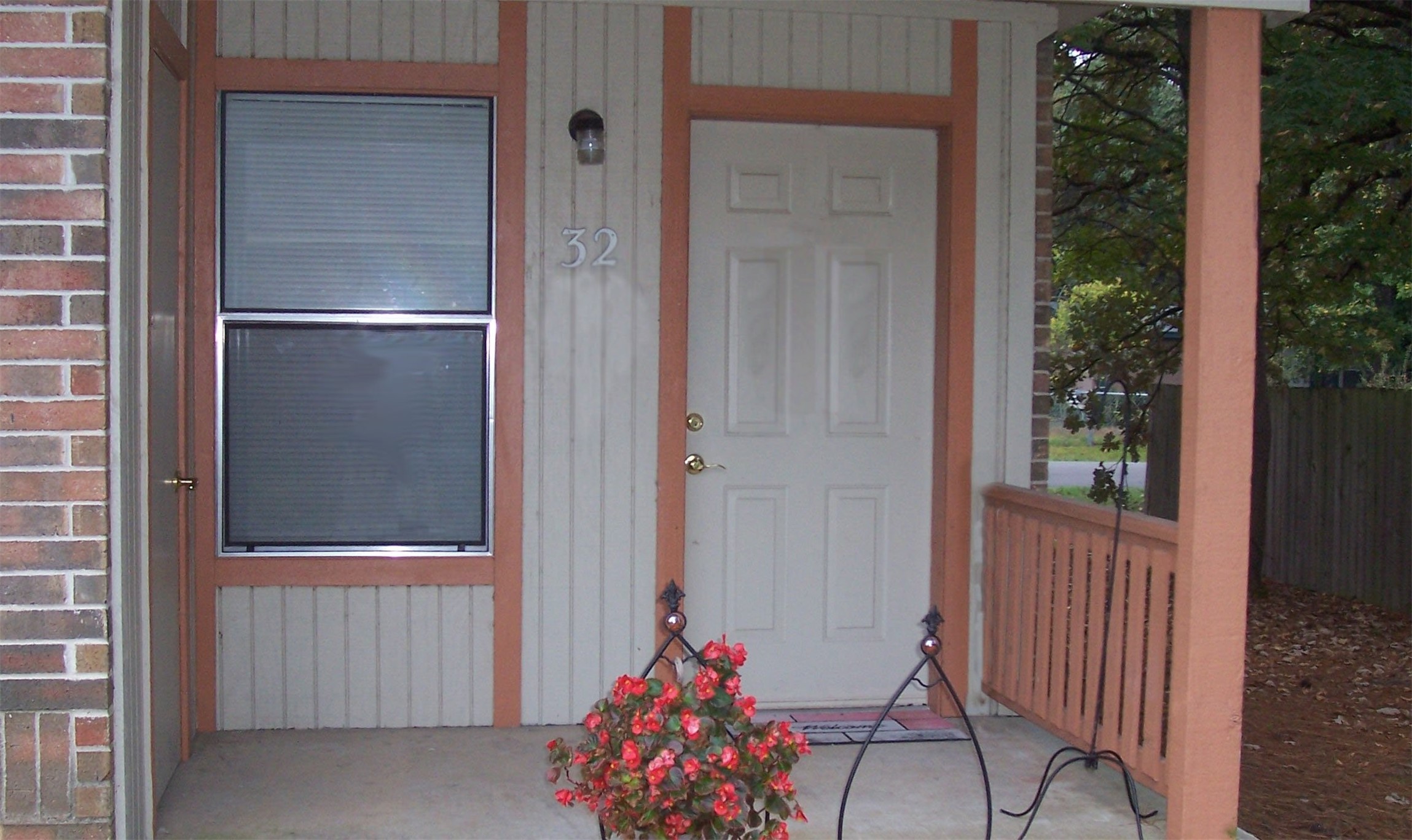 303 E Avenue Hooks, TX 75561 - Photo 6 of 19 a front view of a house with a yard