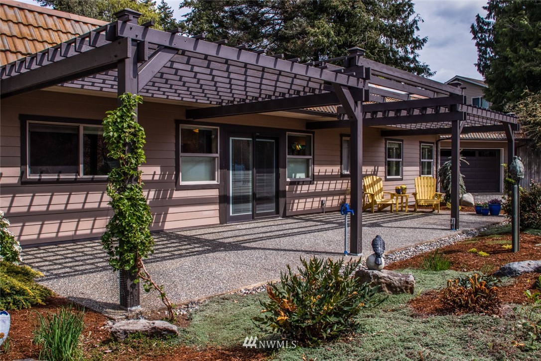 710 Fieldston Road Bellingham, WA 98225 - Photo 1 of 27 a view of a house with fountain in front of retail shop