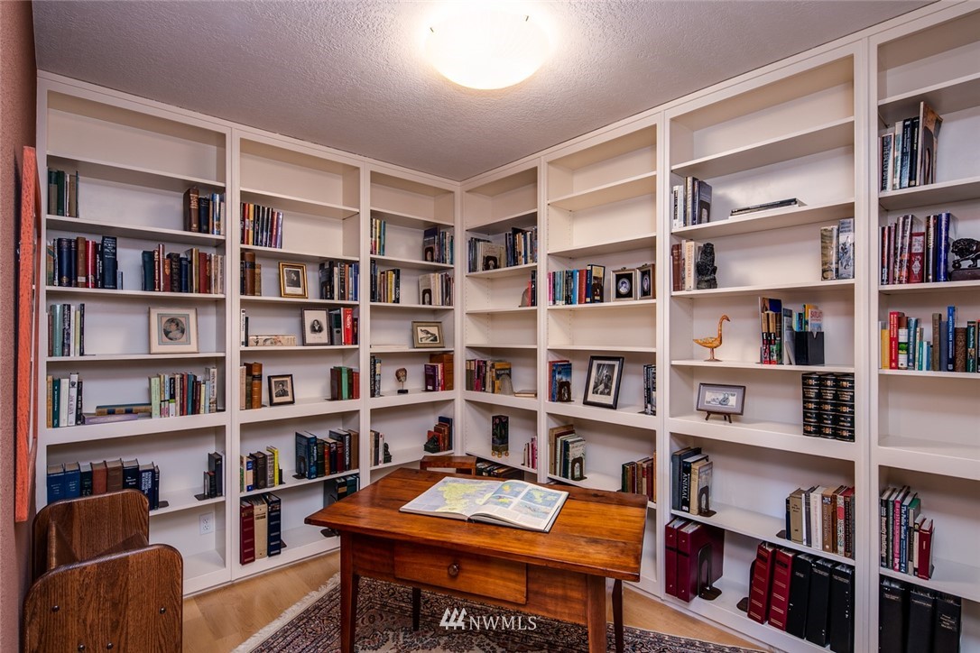 710 Fieldston Road Bellingham, WA 98225 - Photo 13 of 27 a view of a workspace with bookshelf