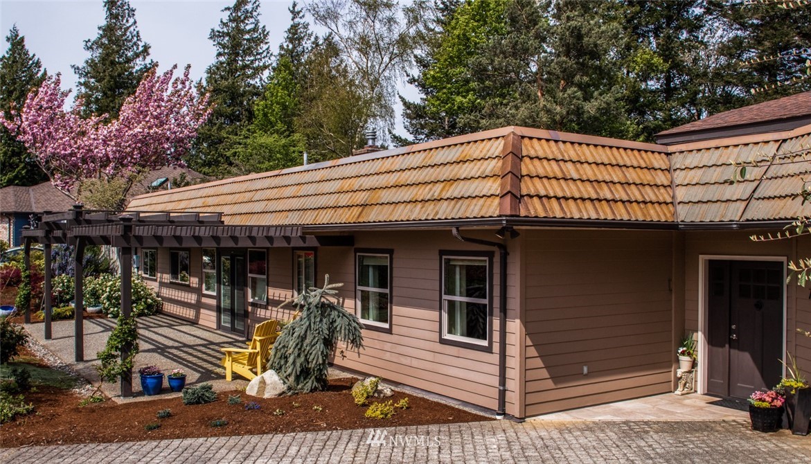 710 Fieldston Road Bellingham, WA 98225 - Photo 3 of 27 a view of a house with a patio
