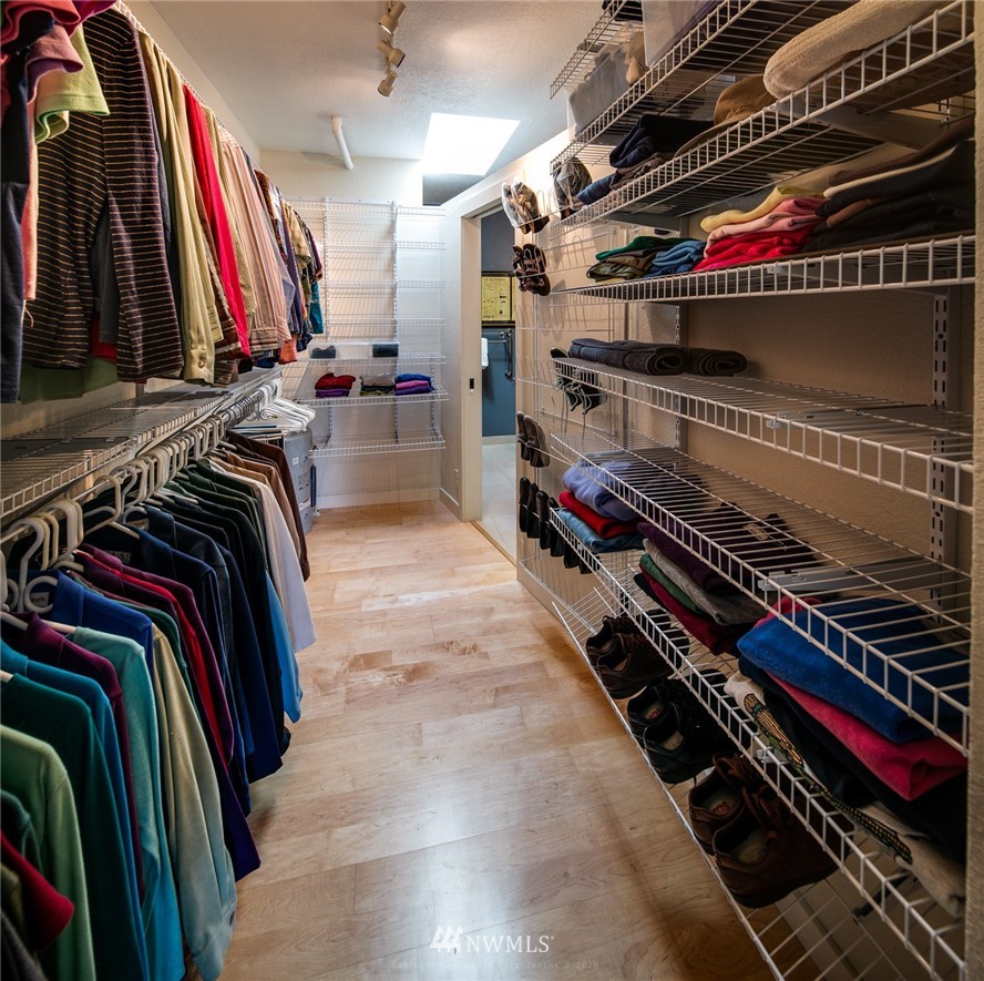 710 Fieldston Road Bellingham, WA 98225 - Photo 21 of 27 a view of walk in closet with clothes and shoes