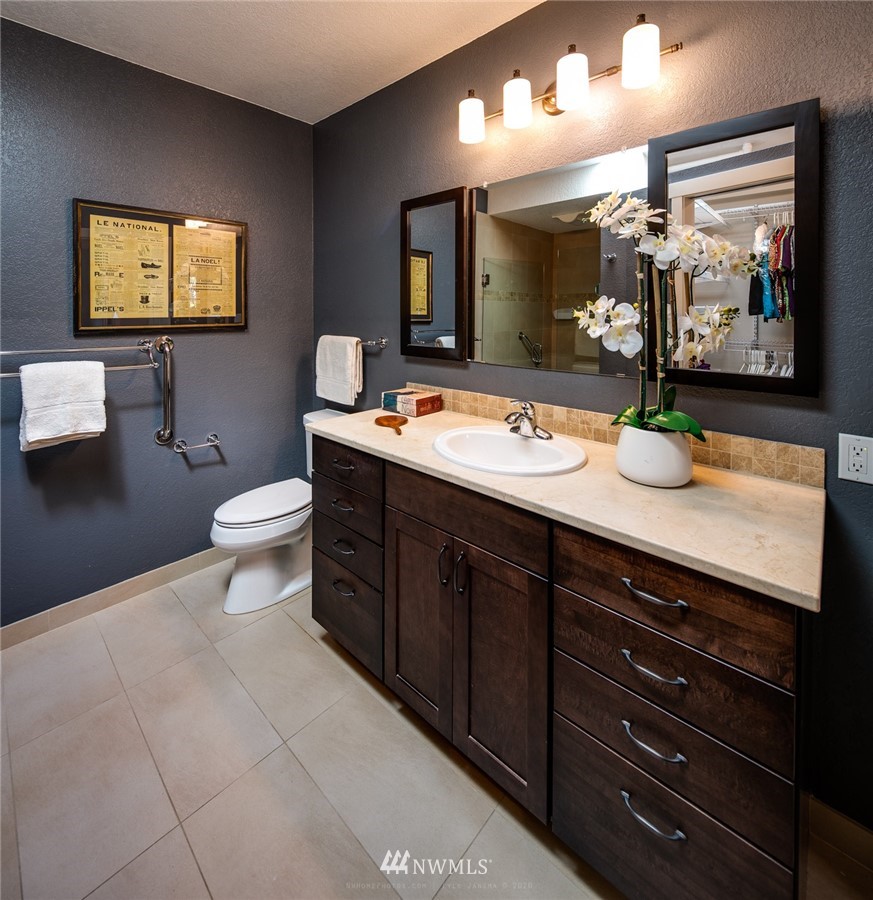 710 Fieldston Road Bellingham, WA 98225 - Photo 22 of 27 a bathroom with a toilet sink and mirror
