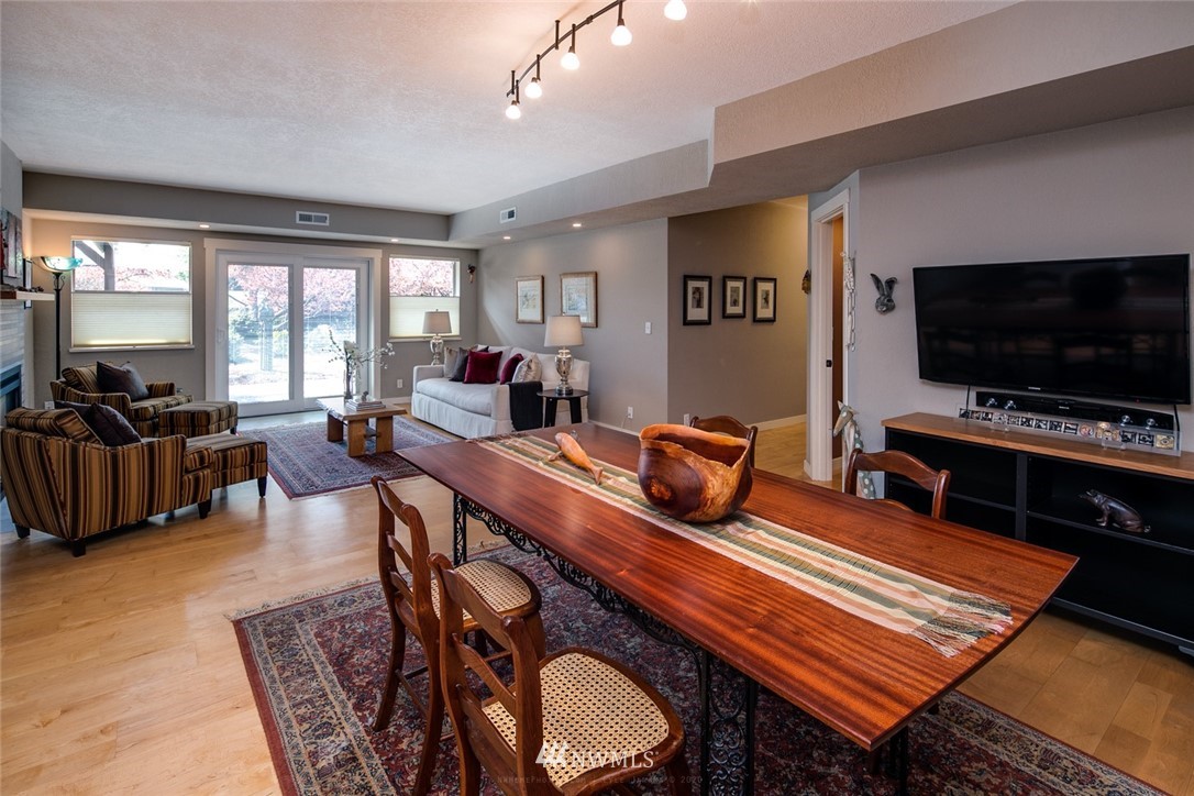 710 Fieldston Road Bellingham, WA 98225 - Photo 7 of 27 a living room with furniture and a flat screen tv