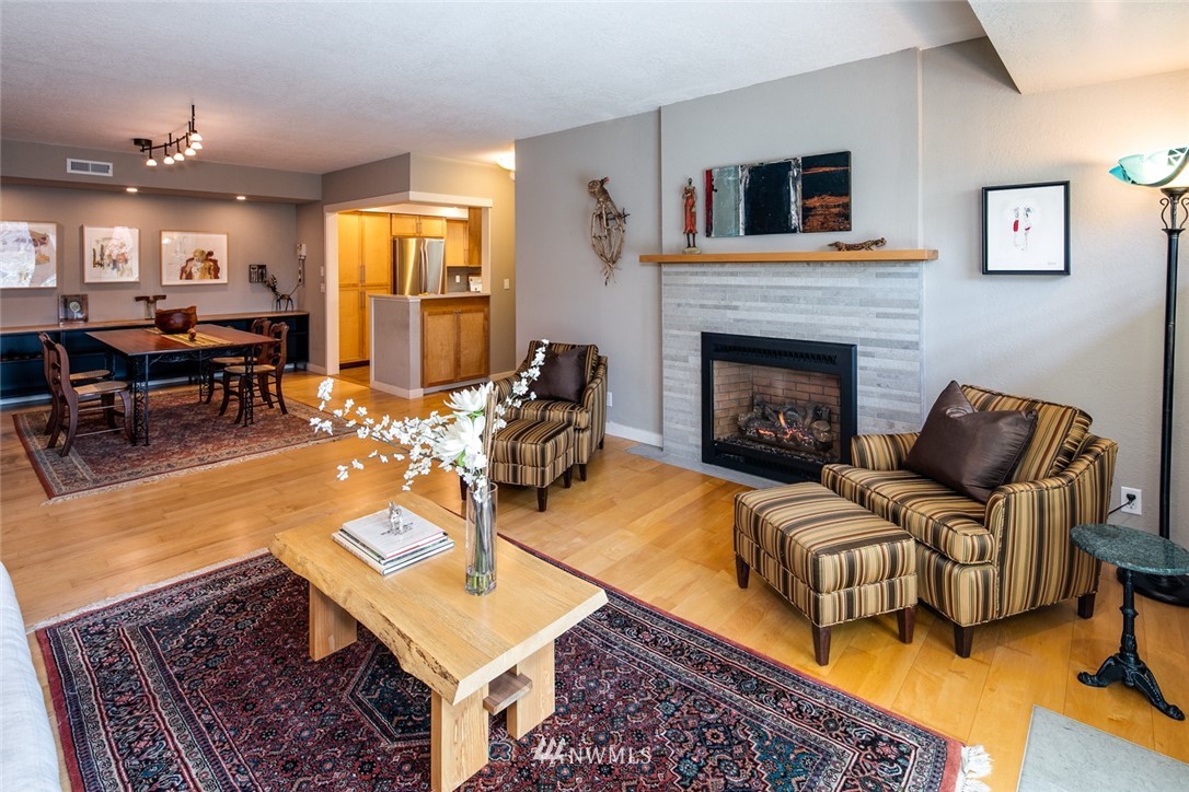 710 Fieldston Road Bellingham, WA 98225 - Photo 9 of 27 a living room with furniture and a fireplace