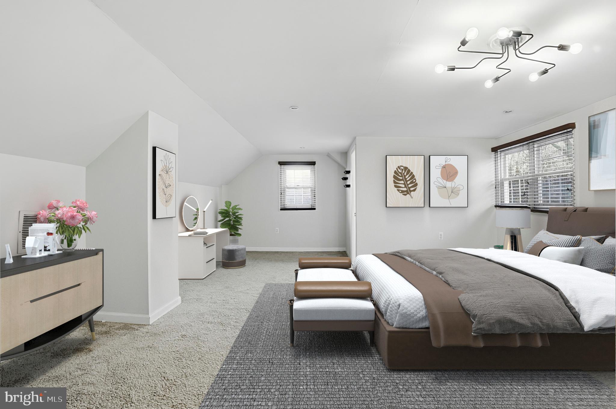 3339 Acton Road Parkville, MD 21234 - Photo 17 of 37 a bedroom with a bed and a chandelier