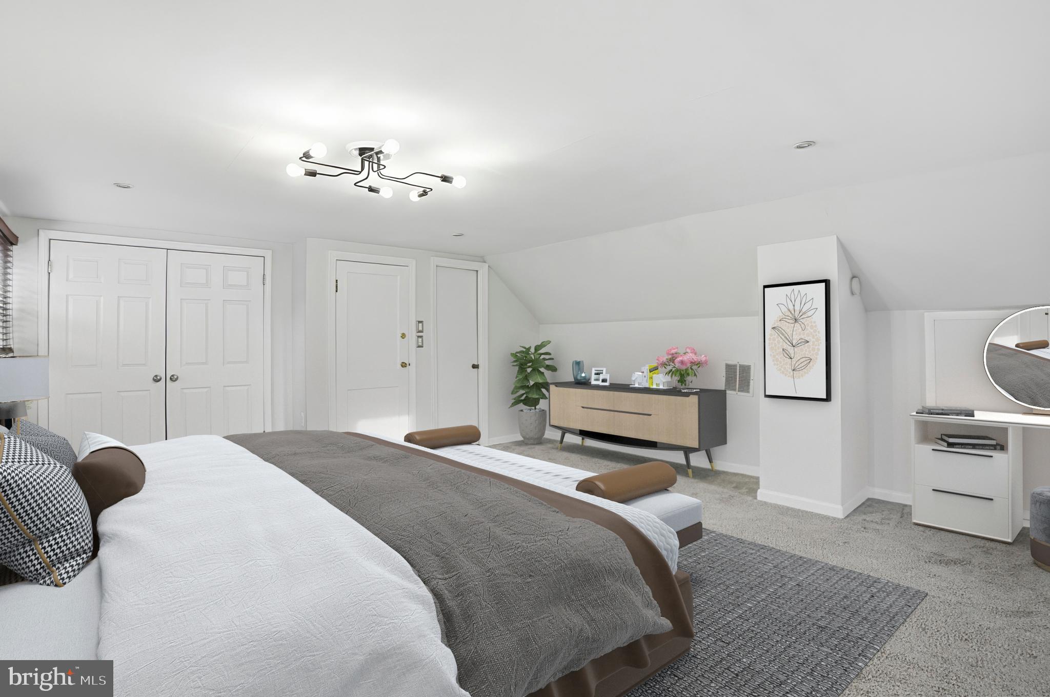 3339 Acton Road Parkville, MD 21234 - Photo 18 of 37 a bedroom with a bed and a chandelier