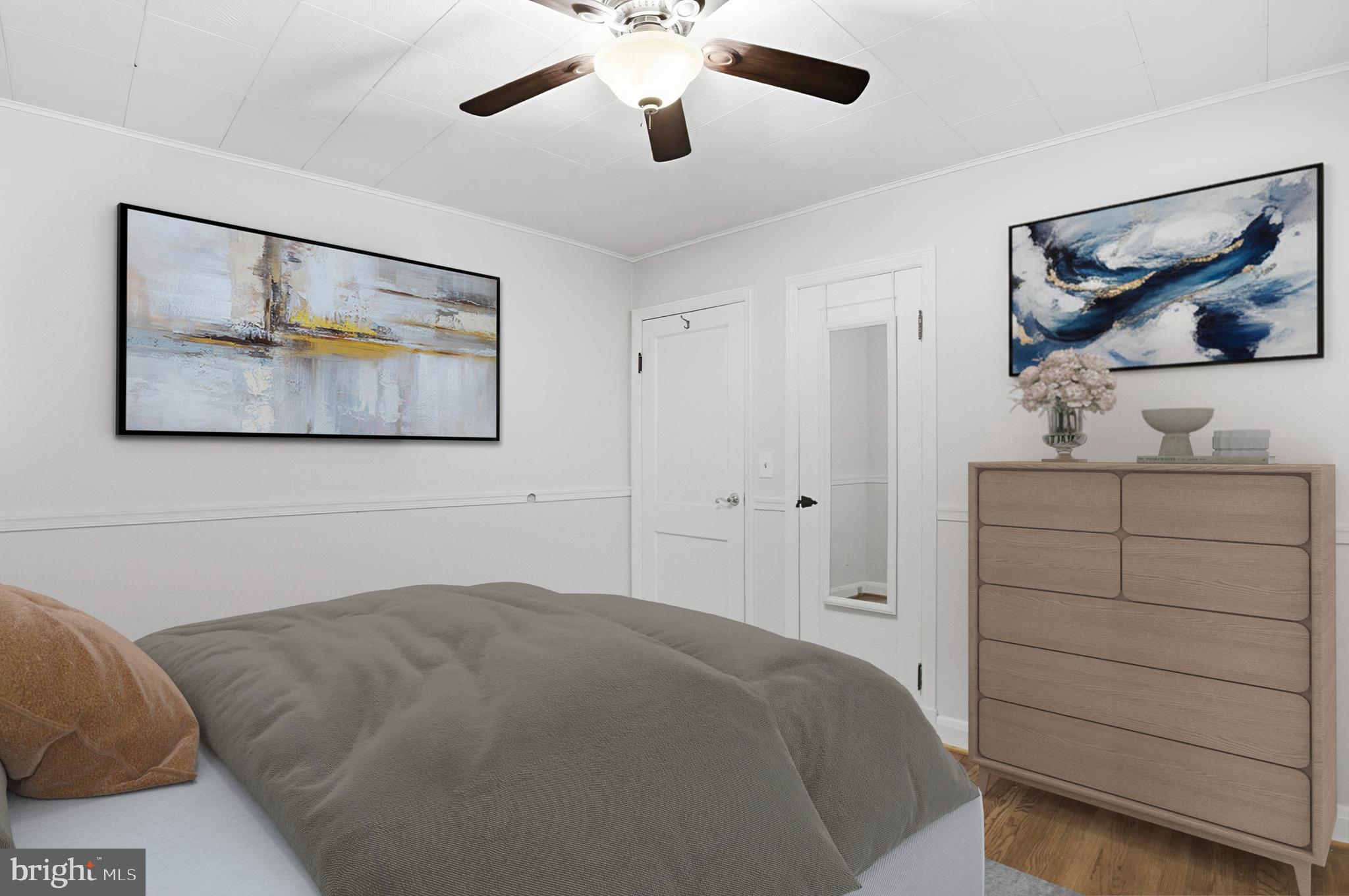 3339 Acton Road Parkville, MD 21234 - Photo 25 of 37 a bedroom with a bed and a dresser