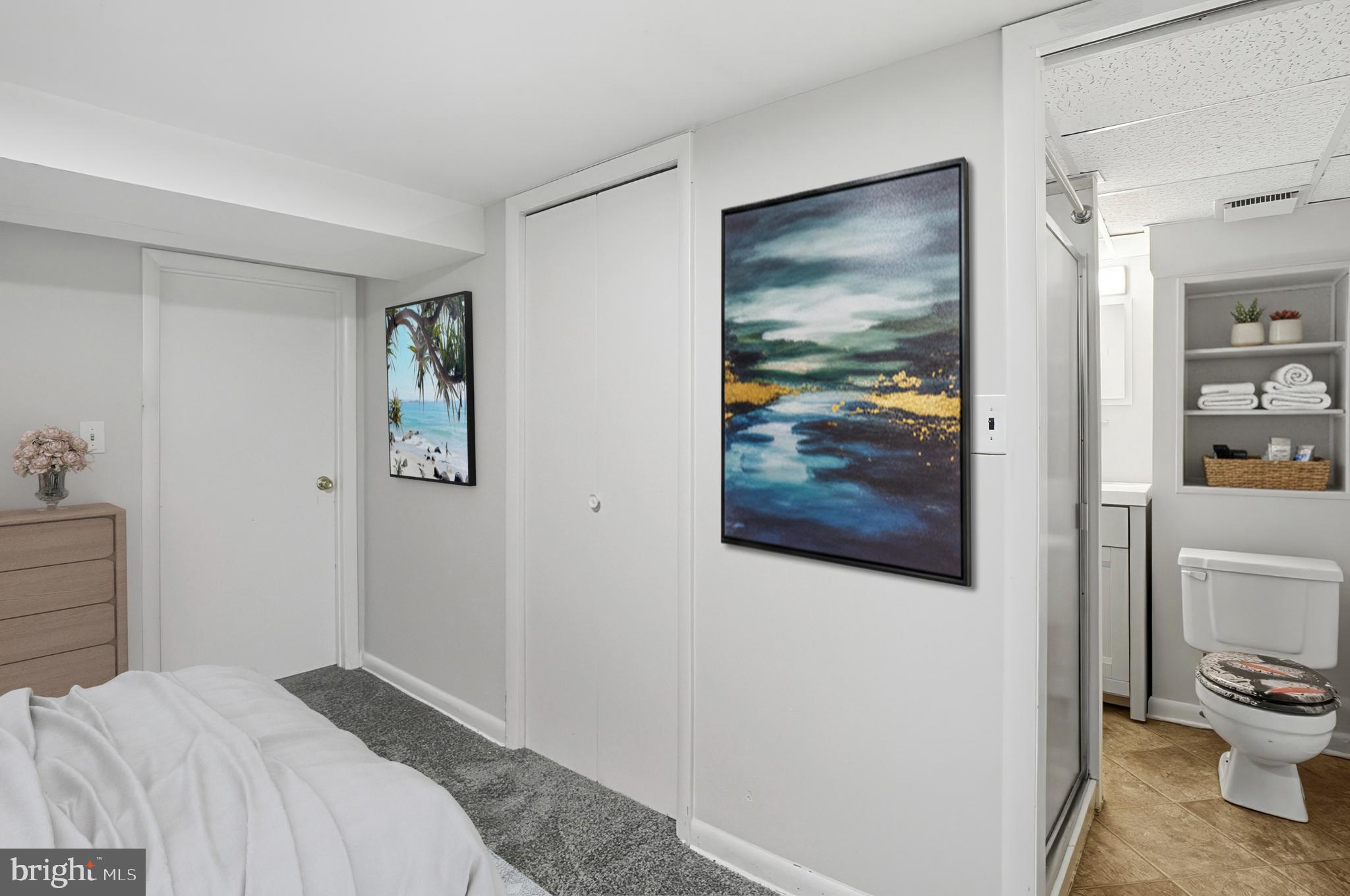 3339 Acton Road Parkville, MD 21234 - Photo 30 of 37 a bedroom with a bed and a view of bathroom