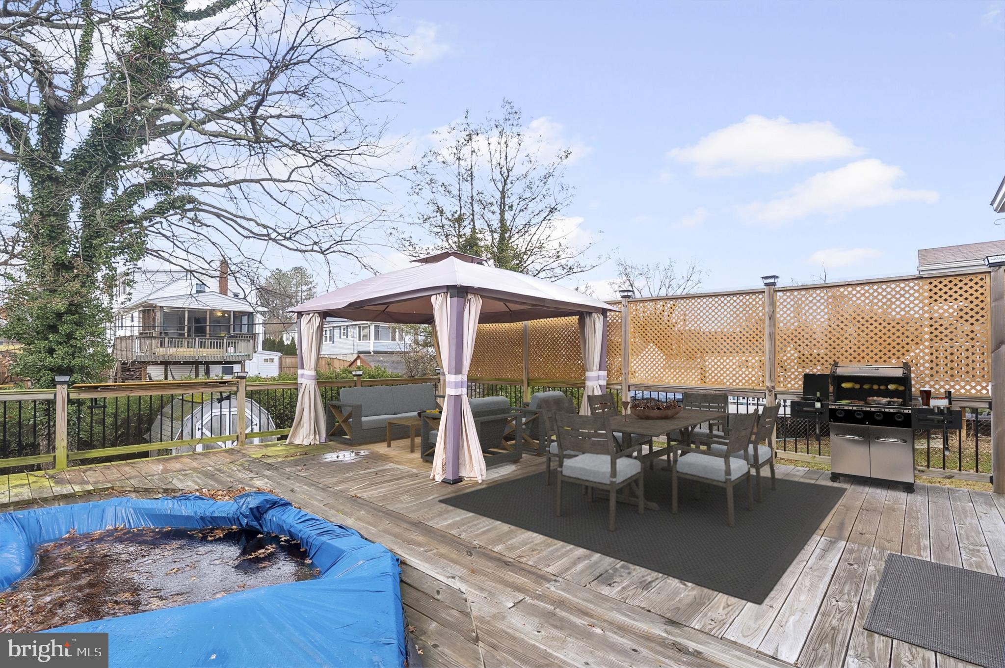 3339 Acton Road Parkville, MD 21234 - Photo 36 of 37 swimming pool view with a seating space
