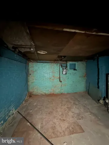 a view of a room with a wooden floor