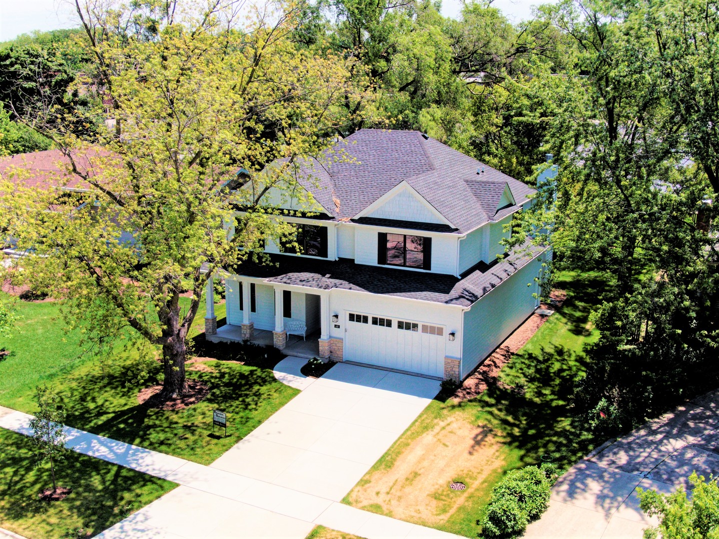 440 West Gartner Road Naperville, IL 60540 - Photo 2 of 22 a aerial view of a house with a yard and potted plants