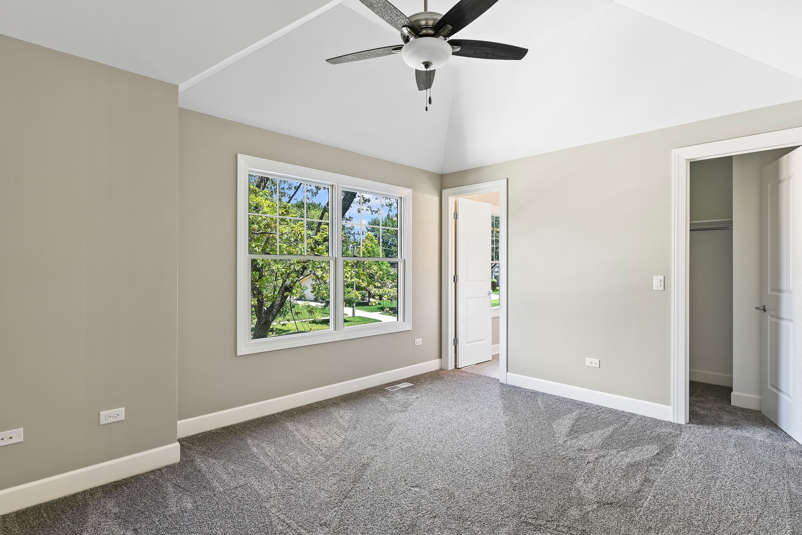 440 West Gartner Road Naperville, IL 60540 - Photo 15 of 22 a view of a livingroom with a ceiling fan and window