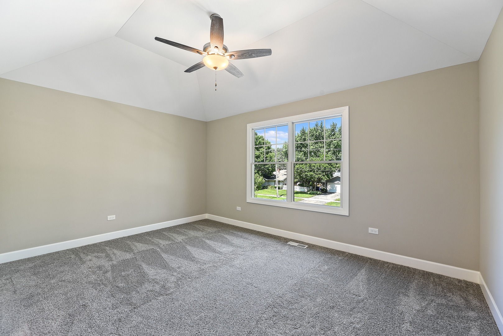 440 West Gartner Road Naperville, IL 60540 - Photo 16 of 22 an empty room with a window and a fan