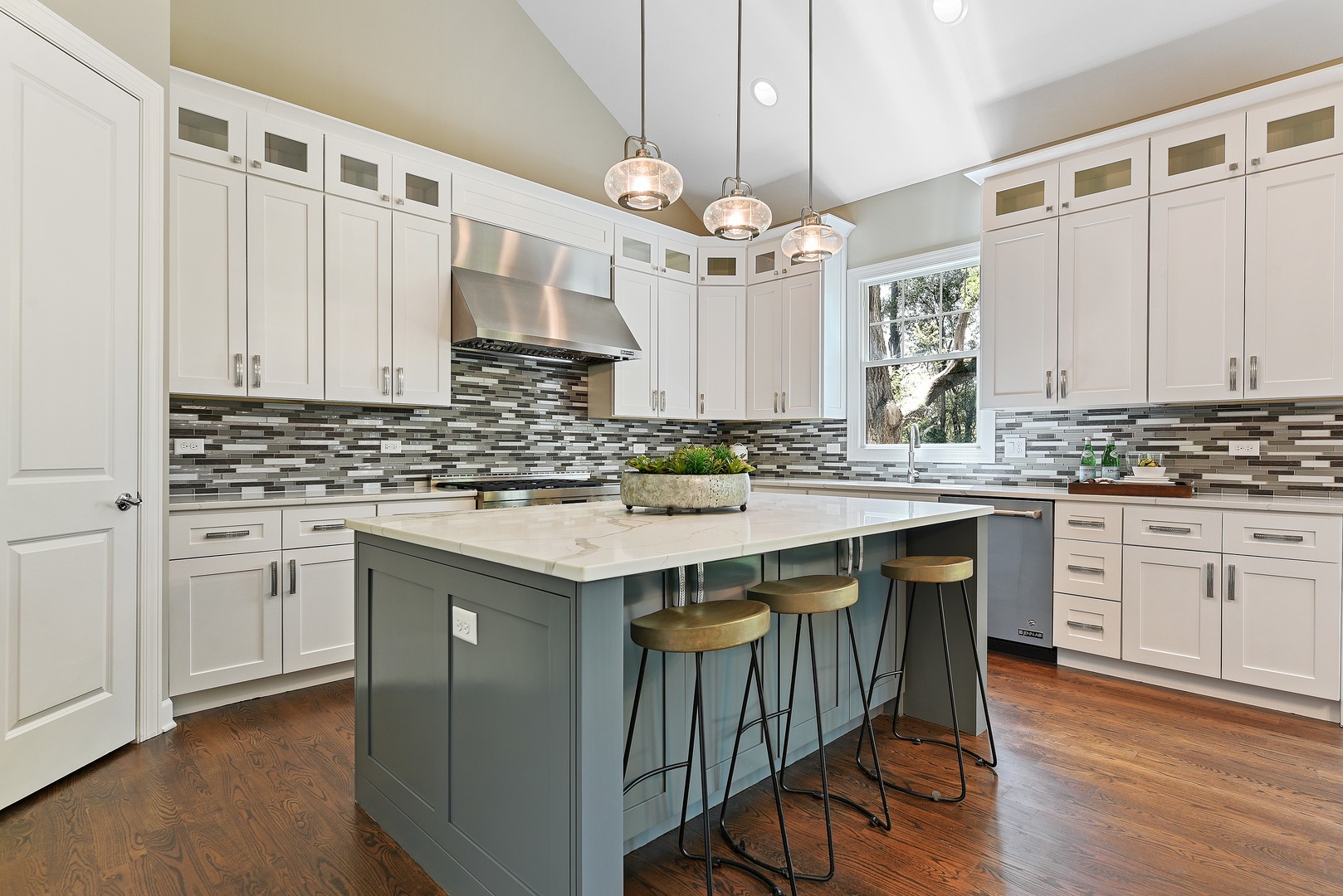 440 West Gartner Road Naperville, IL 60540 - Photo 5 of 22 a kitchen with stainless steel appliances a sink stove and cabinets