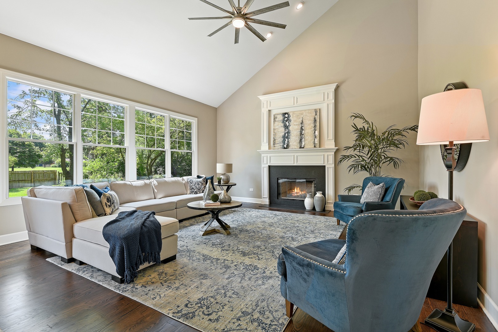 440 West Gartner Road Naperville, IL 60540 - Photo 6 of 22 a living room with furniture fireplace and a large window