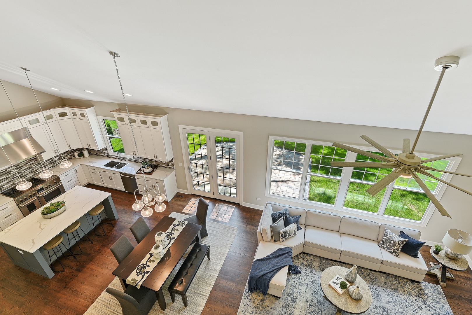 440 West Gartner Road Naperville, IL 60540 - Photo 7 of 22 a living room with furniture and a floor to ceiling window