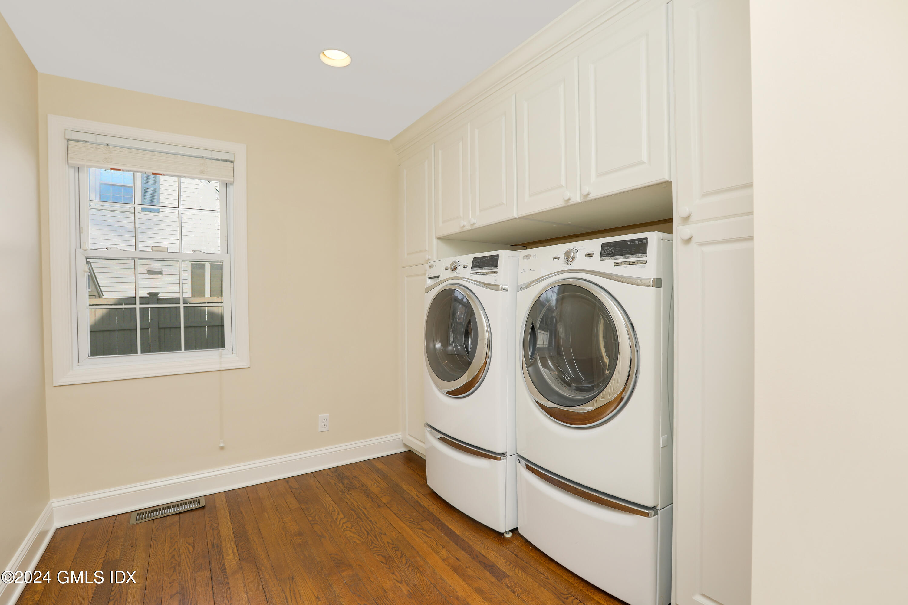 13 Riverside Lane Riverside, CT 06878 - Photo 12 of 25 a utility room with dryer and washer