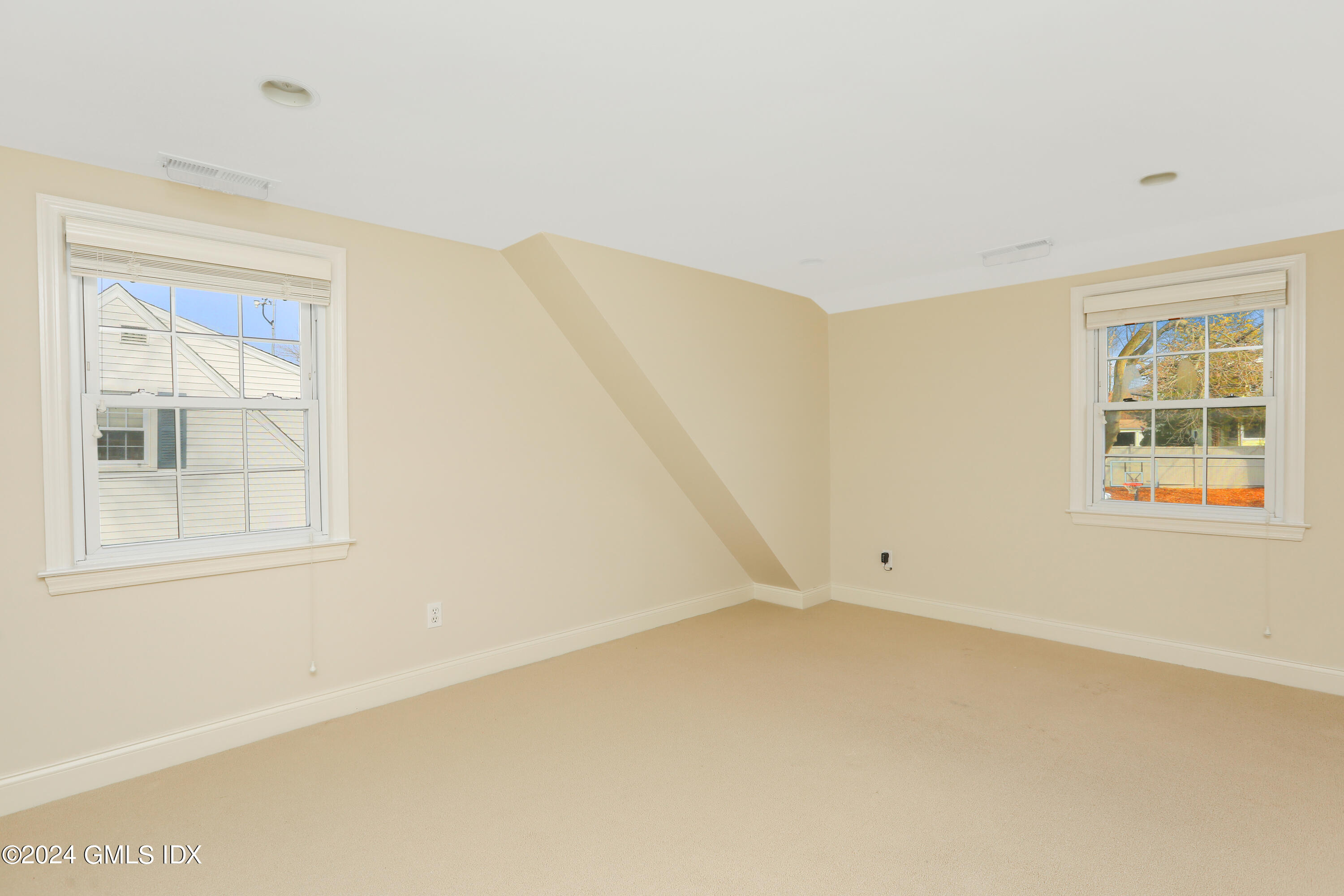 13 Riverside Lane Riverside, CT 06878 - Photo 16 of 25 an empty room with a window