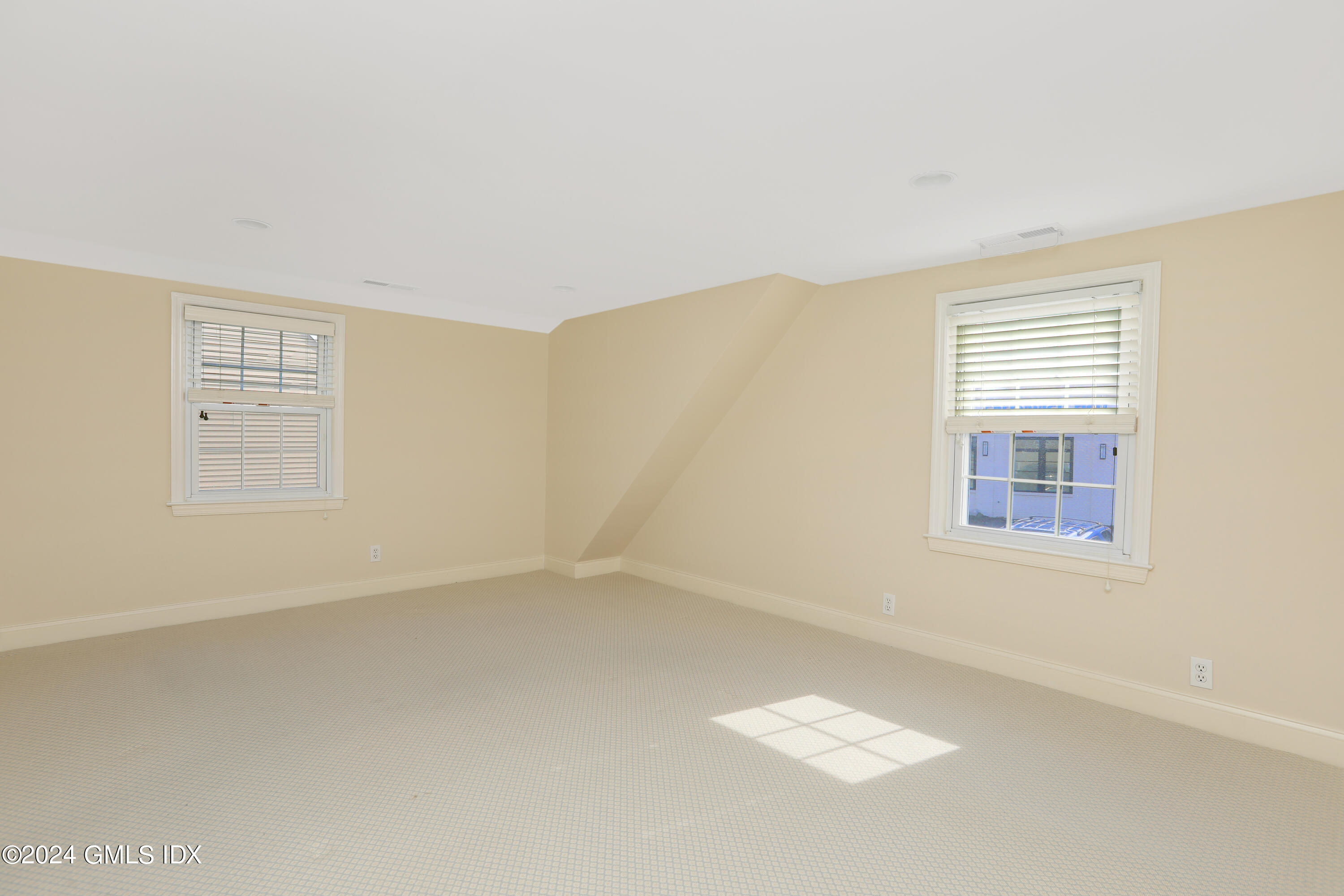 13 Riverside Lane Riverside, CT 06878 - Photo 17 of 25 an empty room with windows