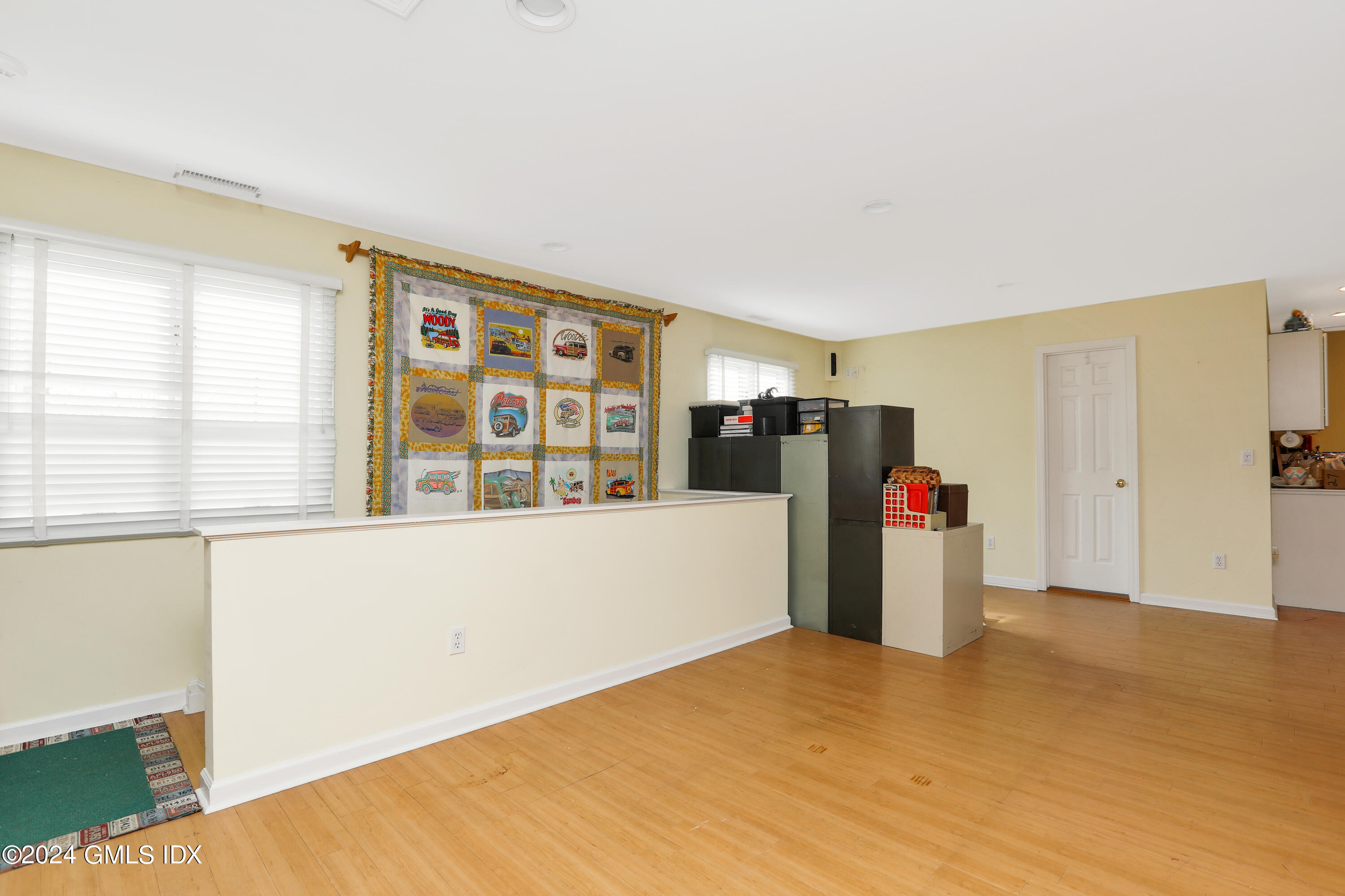 13 Riverside Lane Riverside, CT 06878 - Photo 19 of 25 a view of an empty room with a window
