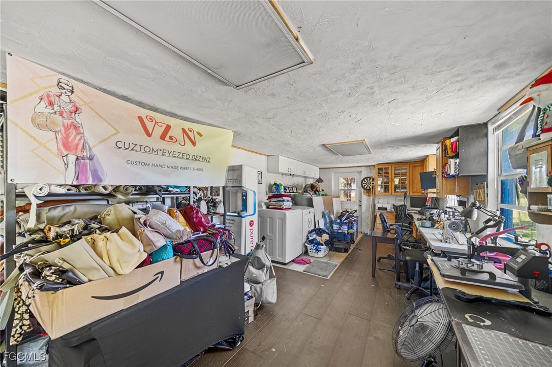 4121 16th Avenue Northeast Naples, FL 34120 - Photo 16 of 35 a view of a room with lots of stuff