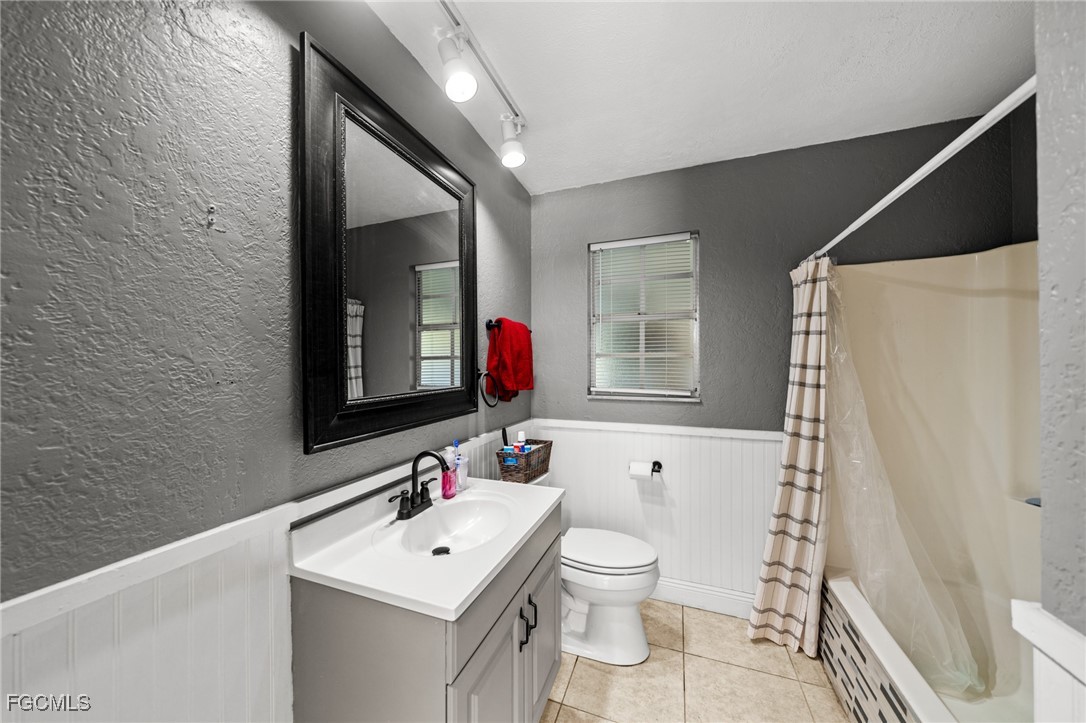 4121 16th Avenue Northeast Naples, FL 34120 - Photo 20 of 35 a bathroom with a sink toilet and shower