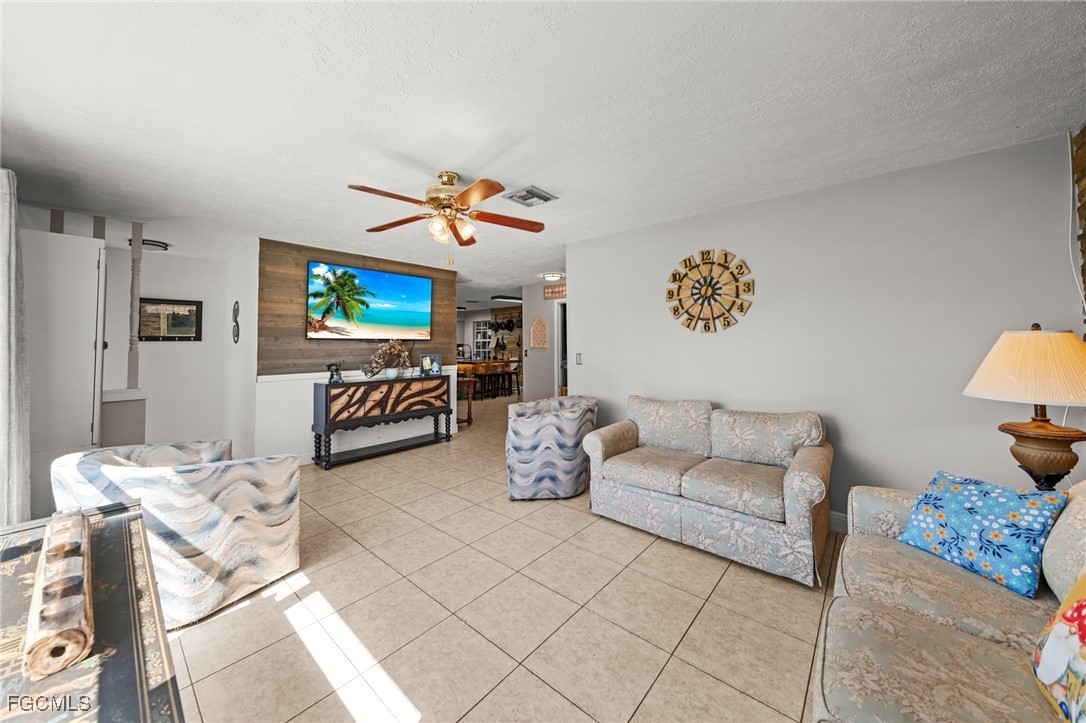 4121 16th Avenue Northeast Naples, FL 34120 - Photo 4 of 35 a living room with furniture