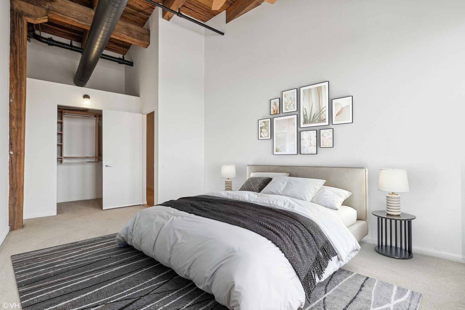 331 South Peoria Street, Unit PH6 Chicago, IL 60607 - Photo 21 of 46 a bedroom with a bed and wooden floor