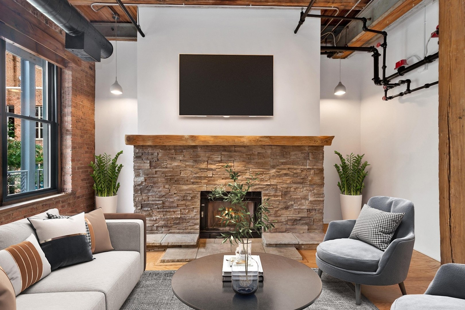 331 South Peoria Street, Unit PH6 Chicago, IL 60607 - Photo 4 of 46 a living room with furniture and a flat screen tv