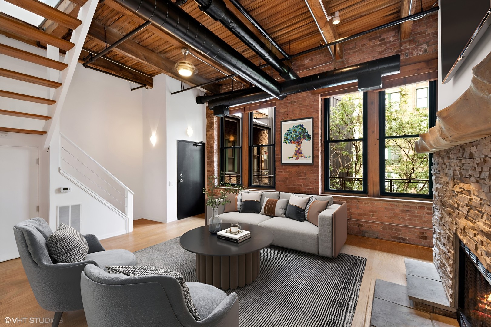 331 South Peoria Street, Unit PH6 Chicago, IL 60607 - Photo 7 of 46 a living room with furniture and a large window