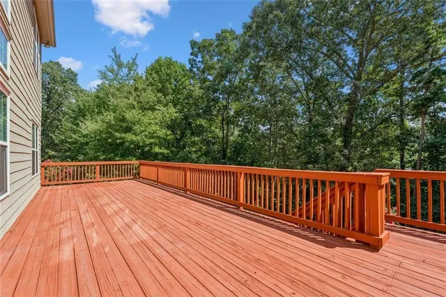 a view of balcony with wooden floor