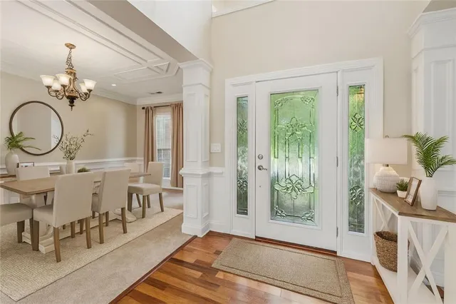 a view of a livingroom with furniture and front door