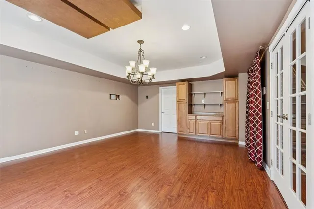 a kitchen with a sink stove and refrigerator