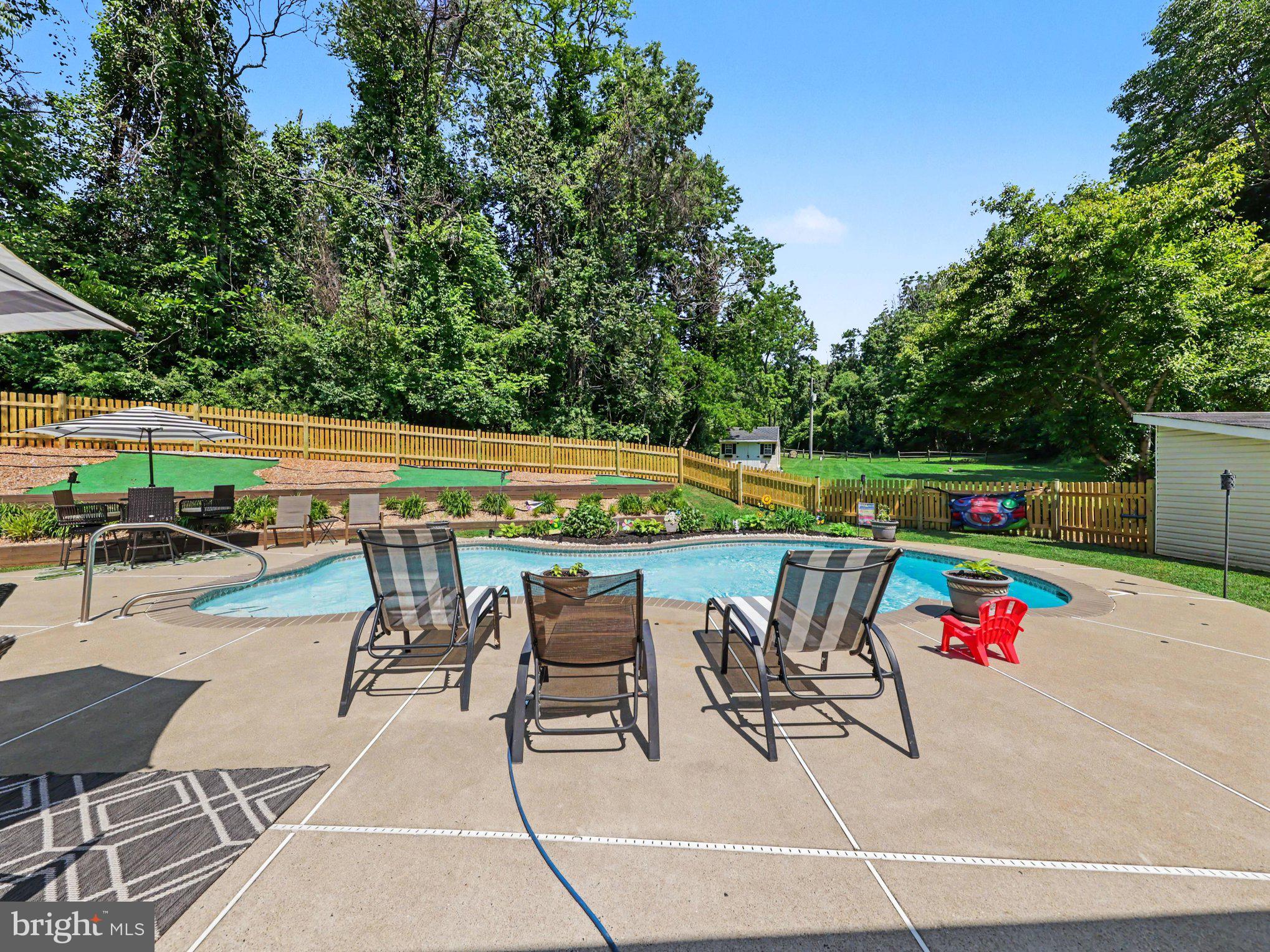 7462 Keith Road Warrenton, VA 20186 - Photo 29 of 37 Pool with large deck area
