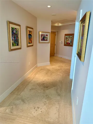 a view of livingroom with hardwood floor and hallway