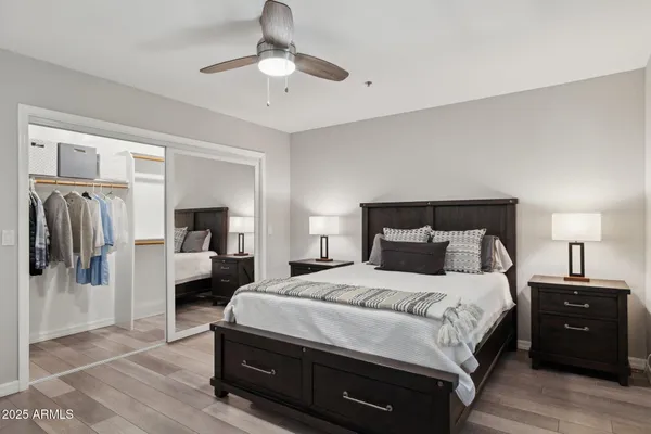 a bedroom with a bed and a walk in closet