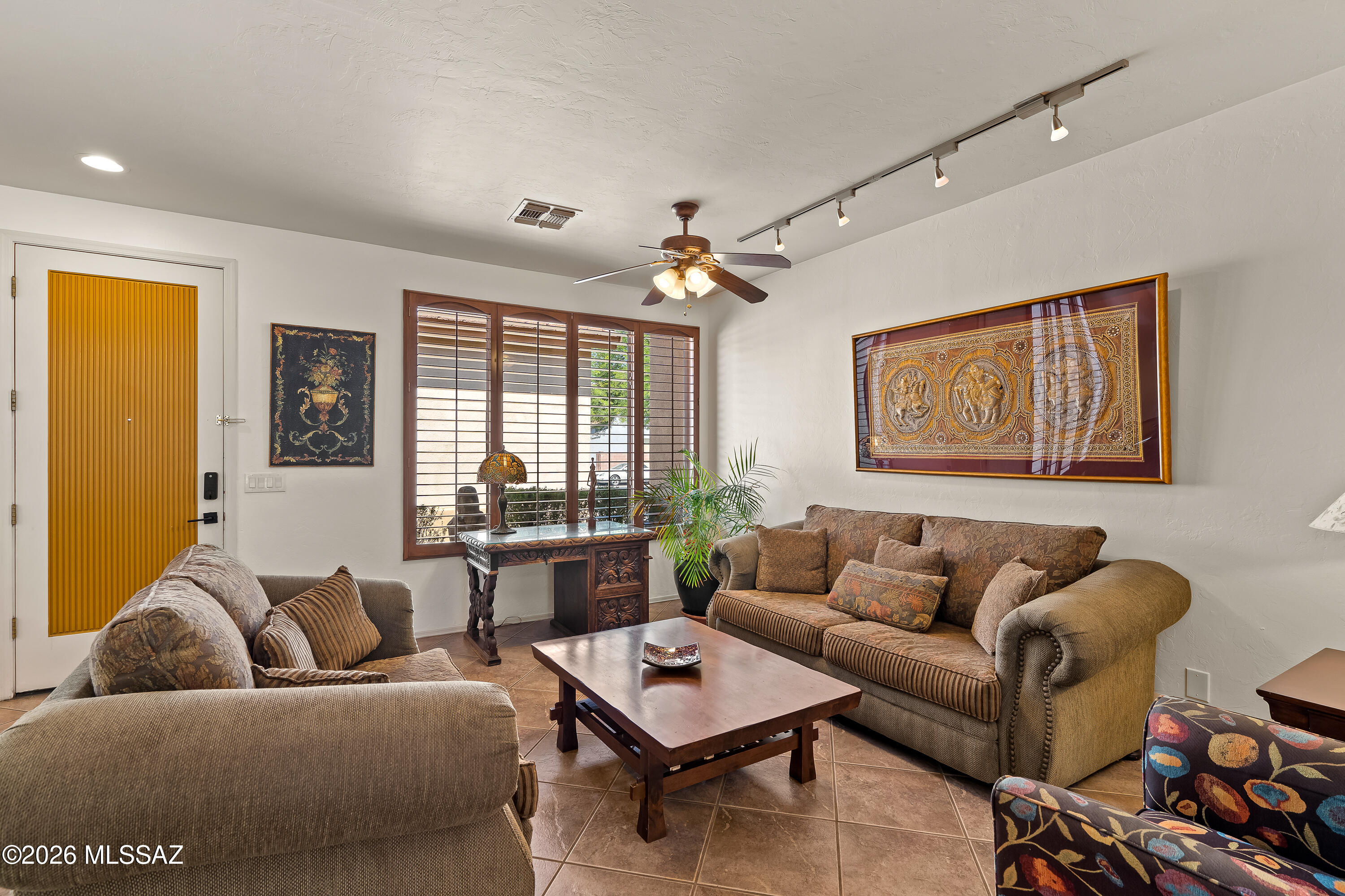 3396 North Camino Rio Colorado Tucson, AZ 85712 - Photo 3 of 32 a living room with furniture and a window