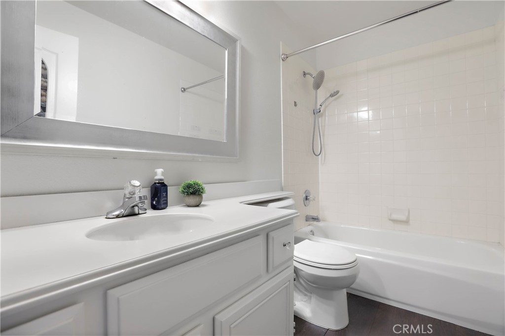 17316 Cold Spring Circle Riverside, CA 92503 - Photo 22 of 46 a bathroom with a sink a toilet and a bathtub