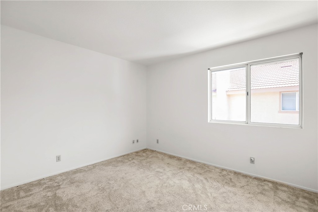 17316 Cold Spring Circle Riverside, CA 92503 - Photo 32 of 46 an empty room with a window