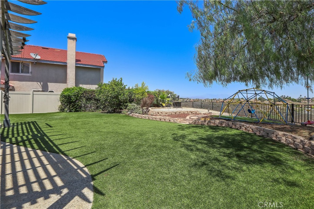 17316 Cold Spring Circle Riverside, CA 92503 - Photo 44 of 46 a view of a yard with plants