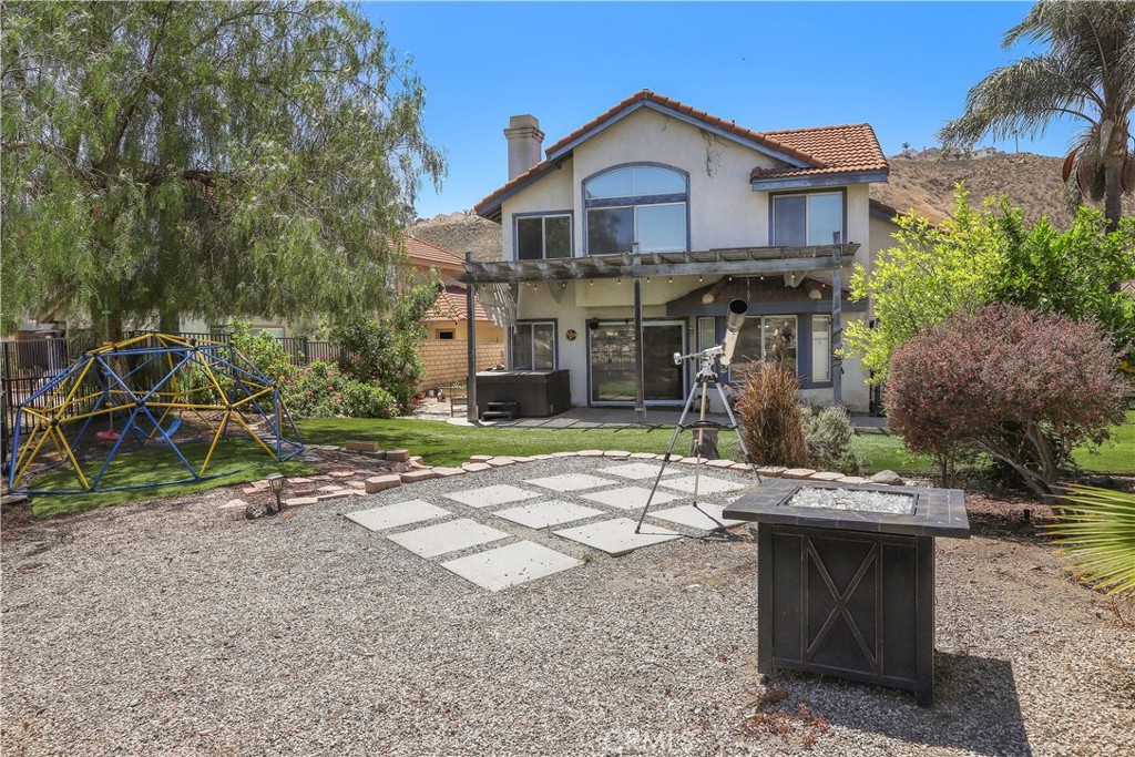 17316 Cold Spring Circle Riverside, CA 92503 - Photo 45 of 46 a front view of a house with garden