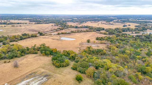 an aerial view of residential building and lake view