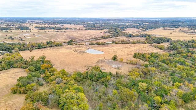 an aerial view of residential building and lake view