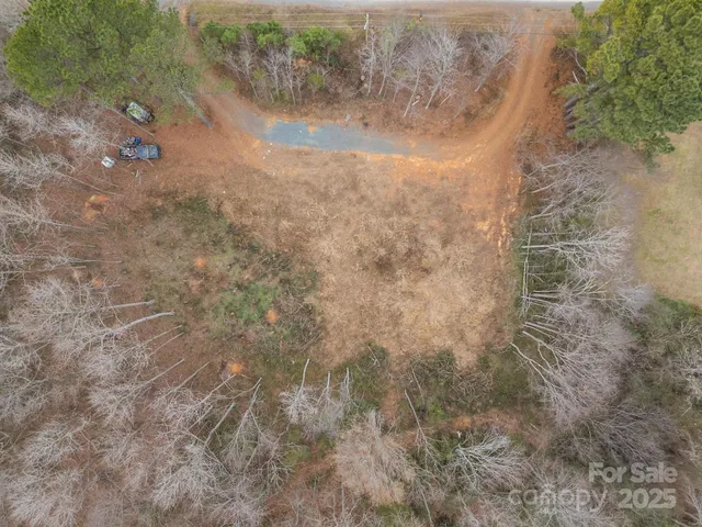 an aerial view of a town with couple of houses