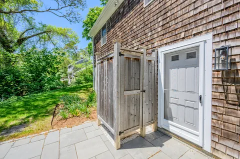 a view of wooden door with outdoor space