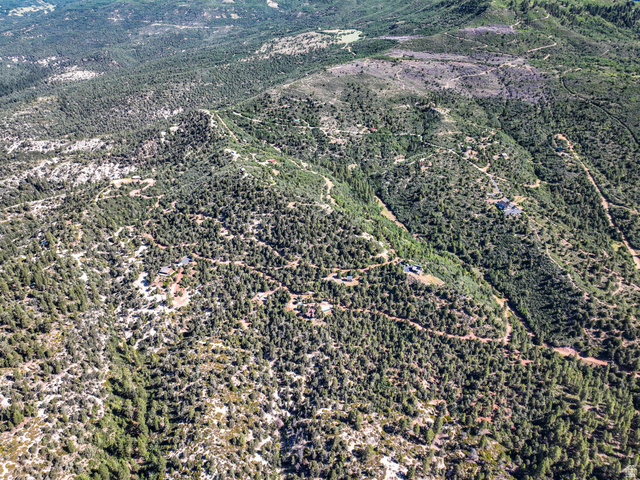 22 Fitzwater Drive, Unit 22 Springdale, UT 84767 - Photo 10 of 21 Expansive aerial view showcasing a mountainous landscape with dense tree coverage