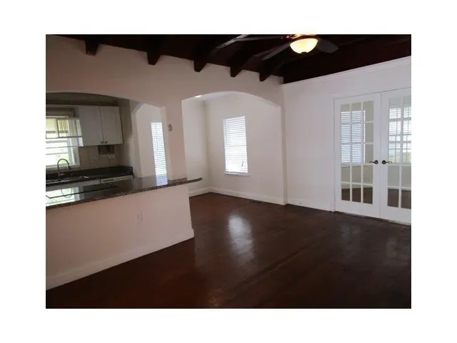a black and white photo of a living room